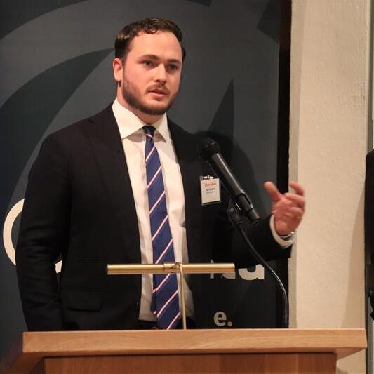 Director Sam Everette speaking at December 3, 2025 Africa Diaspora event. 